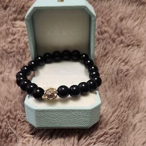 Elegant Black Beaded Bracelet with Gold Accent